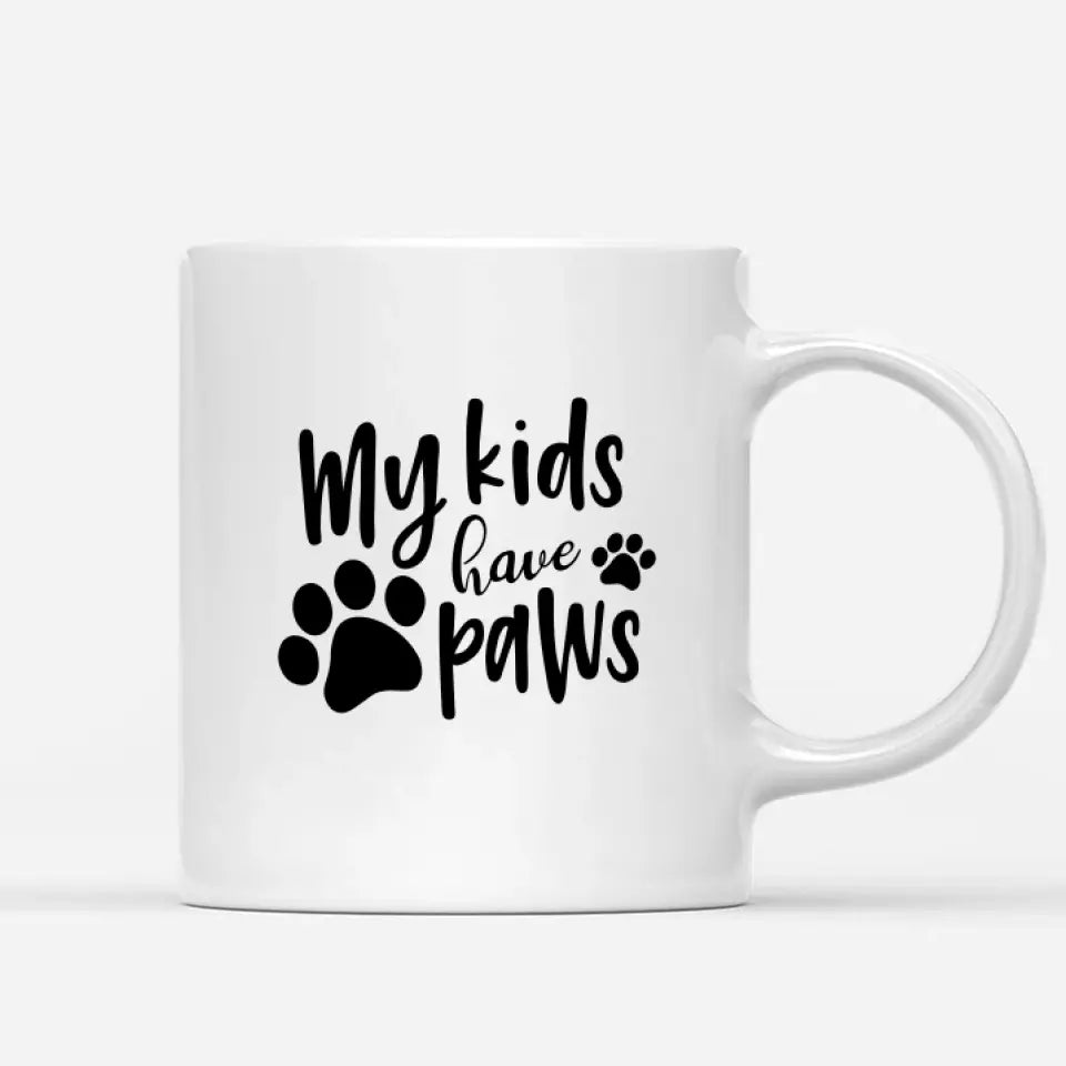 White ceramic coffee mug featuring the phrase "My Kids Have Paws" in bold black font with paw print graphics. Perfect gift for pet lovers, dog moms, and cat dads. Dishwasher and microwave safe. Order now!